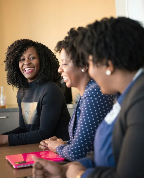 Three women at a business meeting